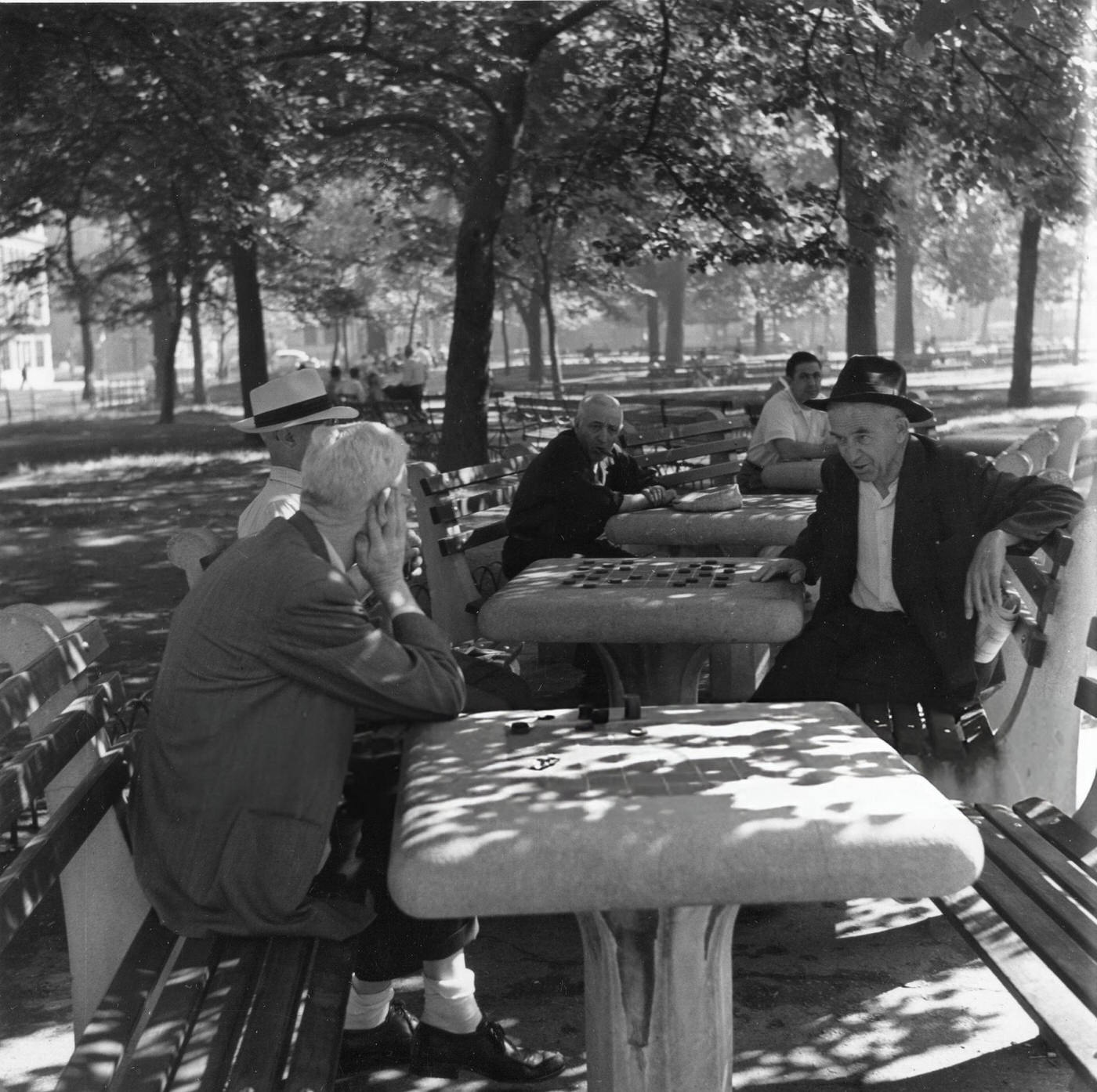 Men play checkers in Washington Square Park, 1954.