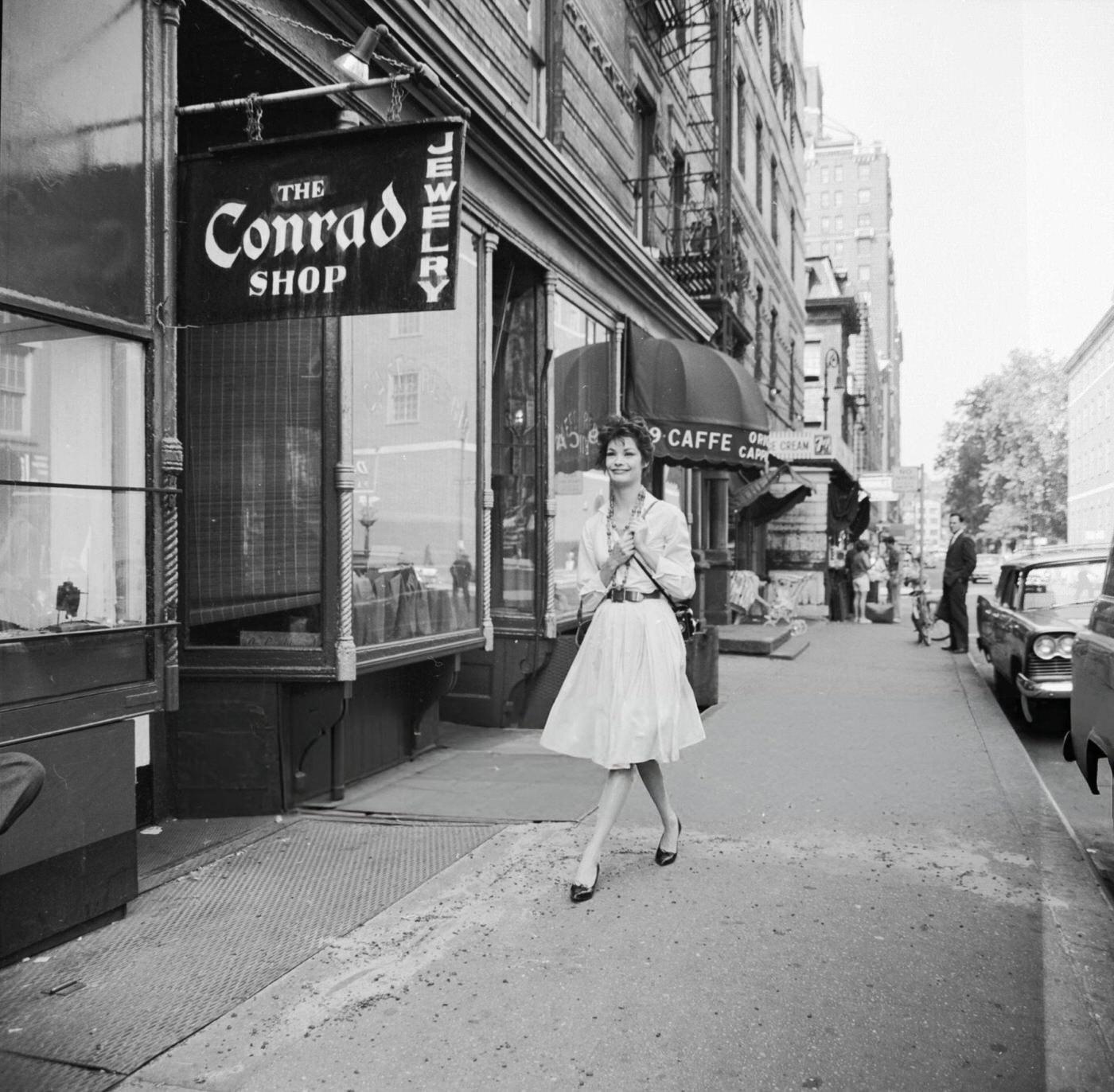 A tourist visits shops and cafes of Greenwich Village, 1956.