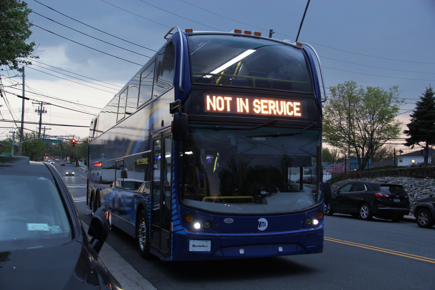 NYCTA No. 0022 working route X17J at Huguenot Avenue and Woodrow Road, 2018.
