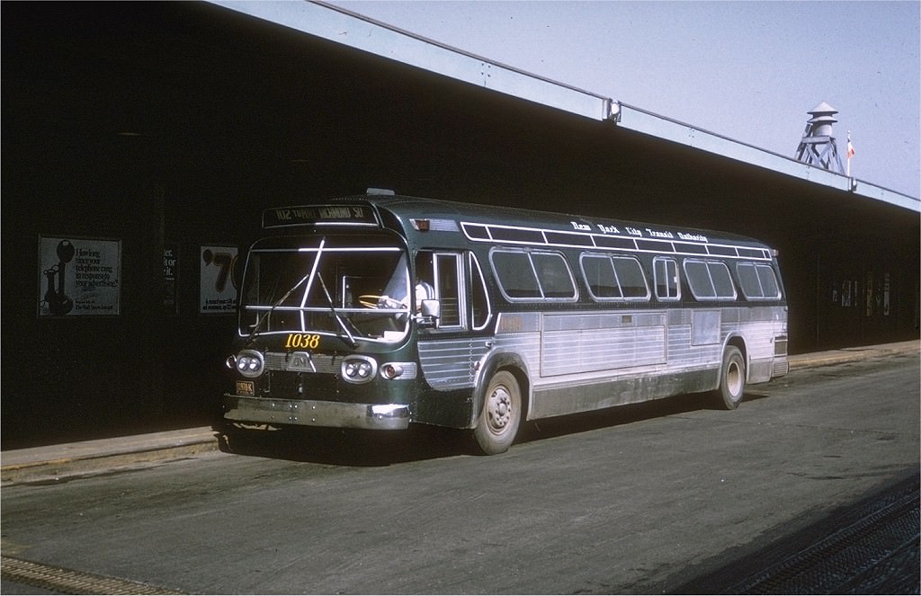 NYCTA No. 1038 working route R102 at St. George Terminal, 1971.