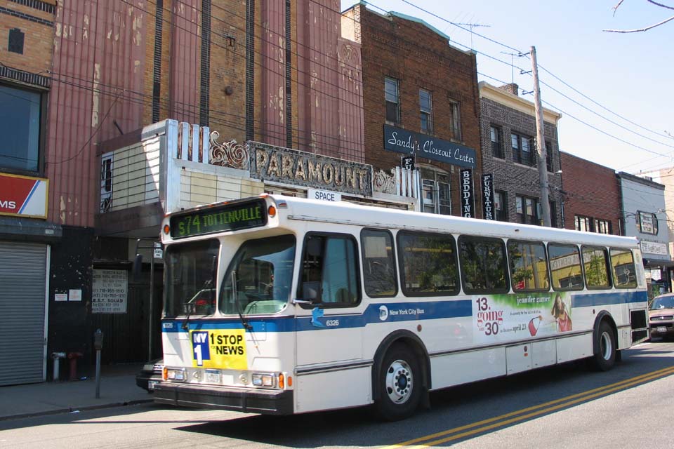 NYCTA No. 6326 working route S74 in front of the shuttered Paramount Theatre at Bay Street & Union Place, 2004.