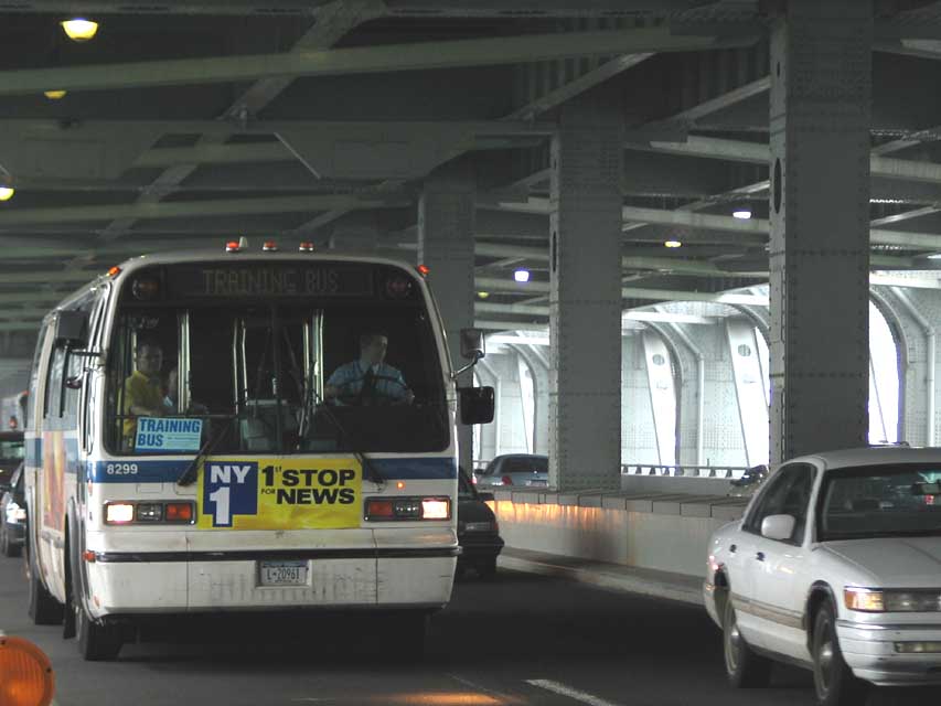 NYCTA Training Bus No. 8299 on the Verrazano Narrows Bridge, 2004.