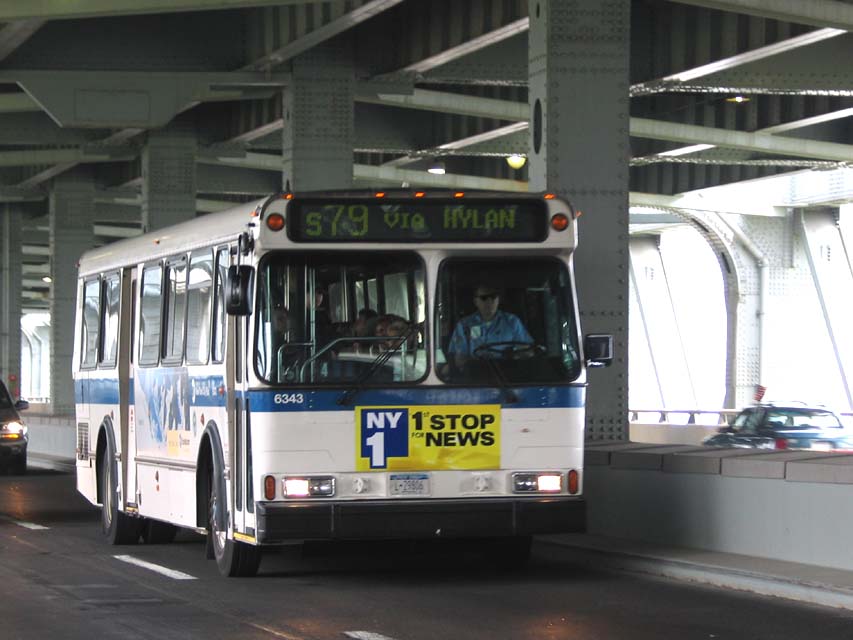 NYCTA No. 6349 working route S79 on the lower level of the Verrazano Narrows Bridge, 2004.