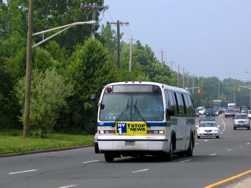 NYCTA No. 8307 working route S79 at Richmond & Independence Avenues, 2004.