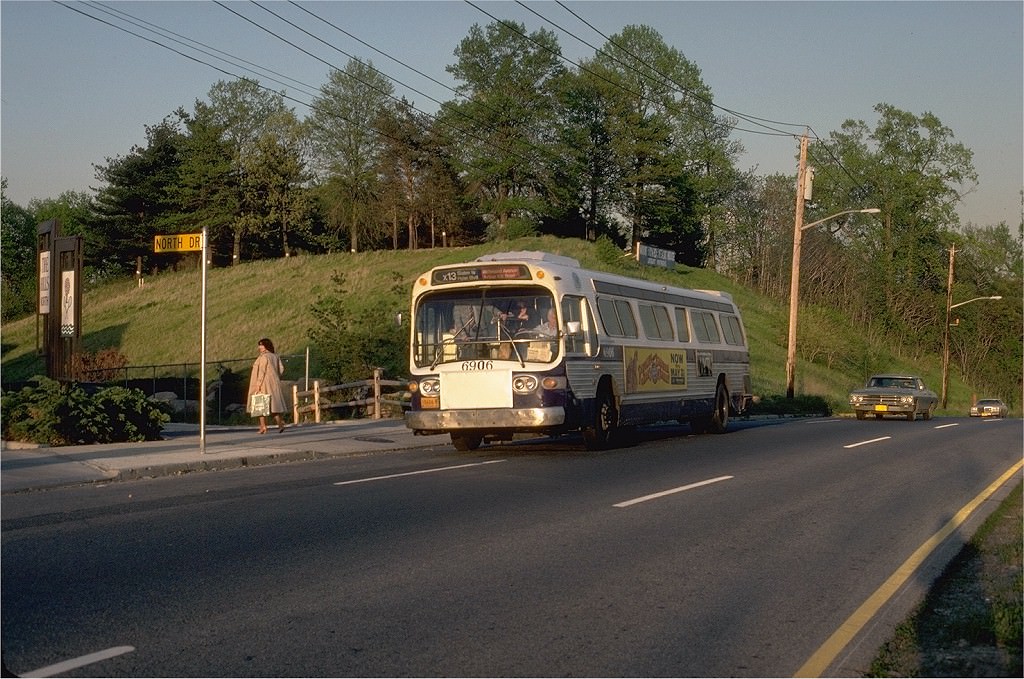 NYCTA No. 6906 working route X13 at Narrows Avenue & North Drive, 1981.