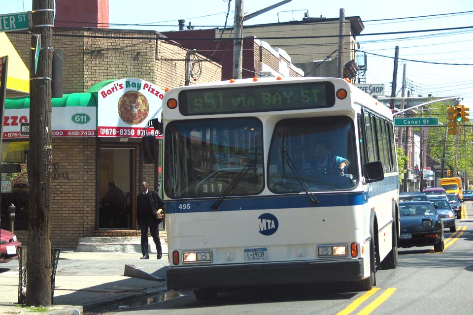 NYCTA No. 495 working route S51 at Bay & Water Streets, 2004.