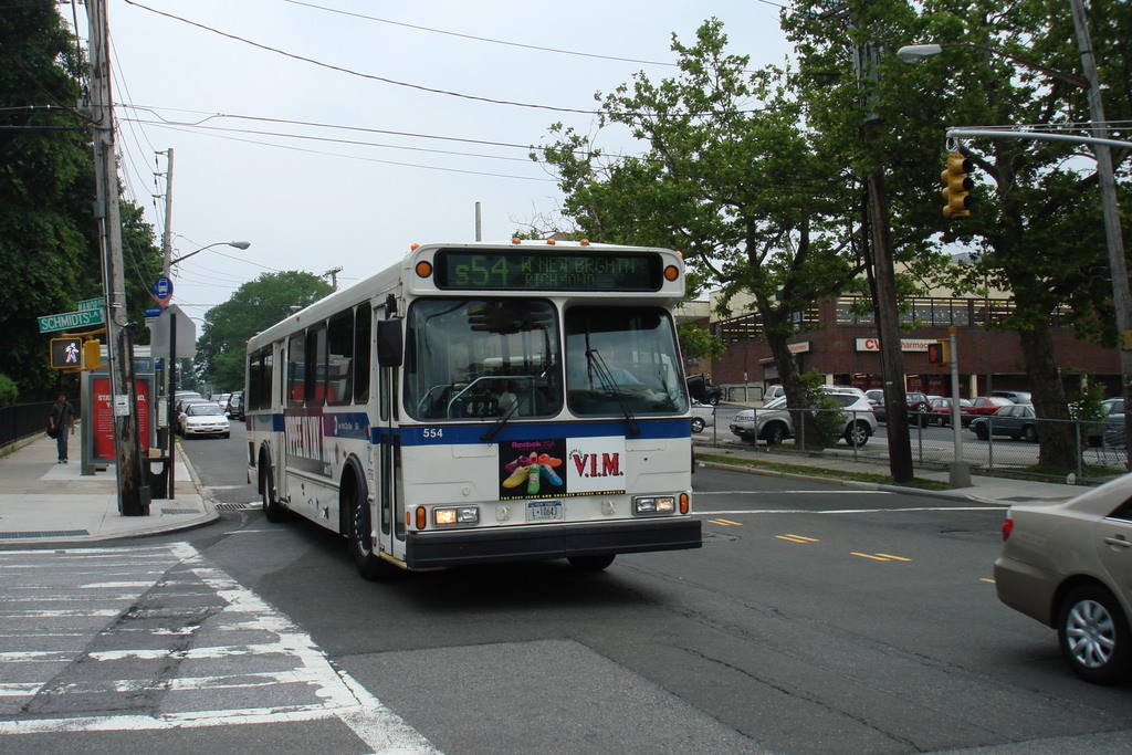 NYCTA No. 554 working route S54 at Manor Road & Schmidts Lane, 2007.
