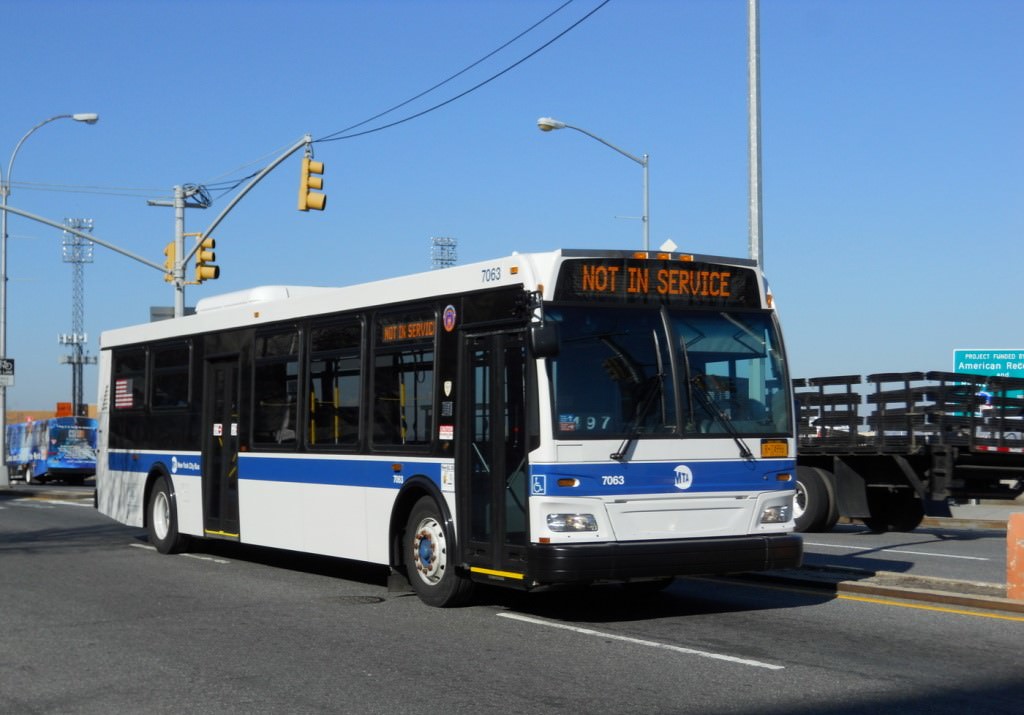 NYCTA No. 7063 at Richmond Terrace & Bay Street, 2012.