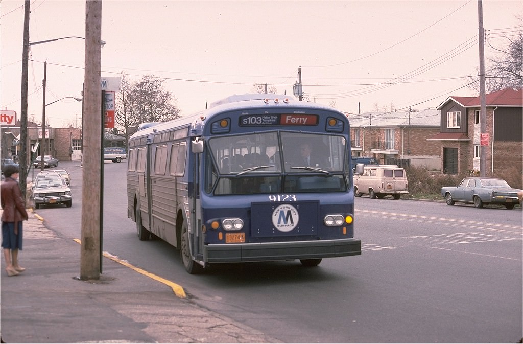 NYCTA No. 9123 working route S103 at Hylan Boulevard & Fingerboard Rd, 1977.