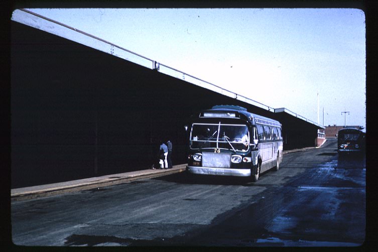 NYCTA No. 74 working route R107 at St. George Terminal, 1971.