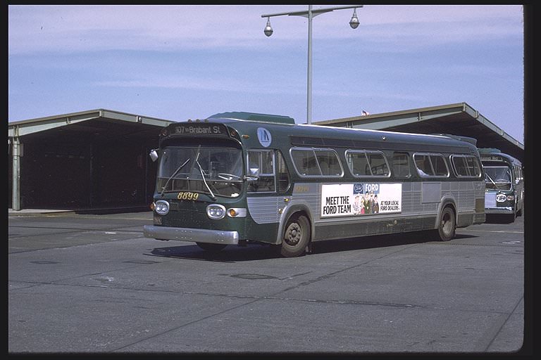 NYCTA No. 8899 working route R107 at St. George Terminal, 1971.