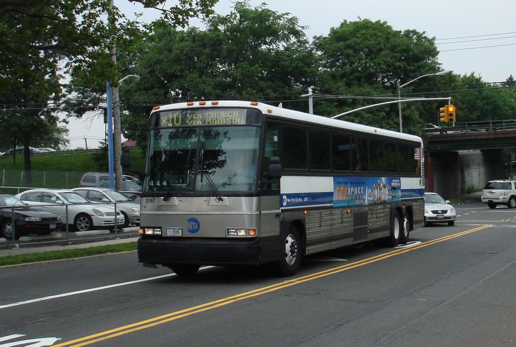 NYCTA No. 2067 working route X10 at Manor Road & Schmidts Lane, 2007.