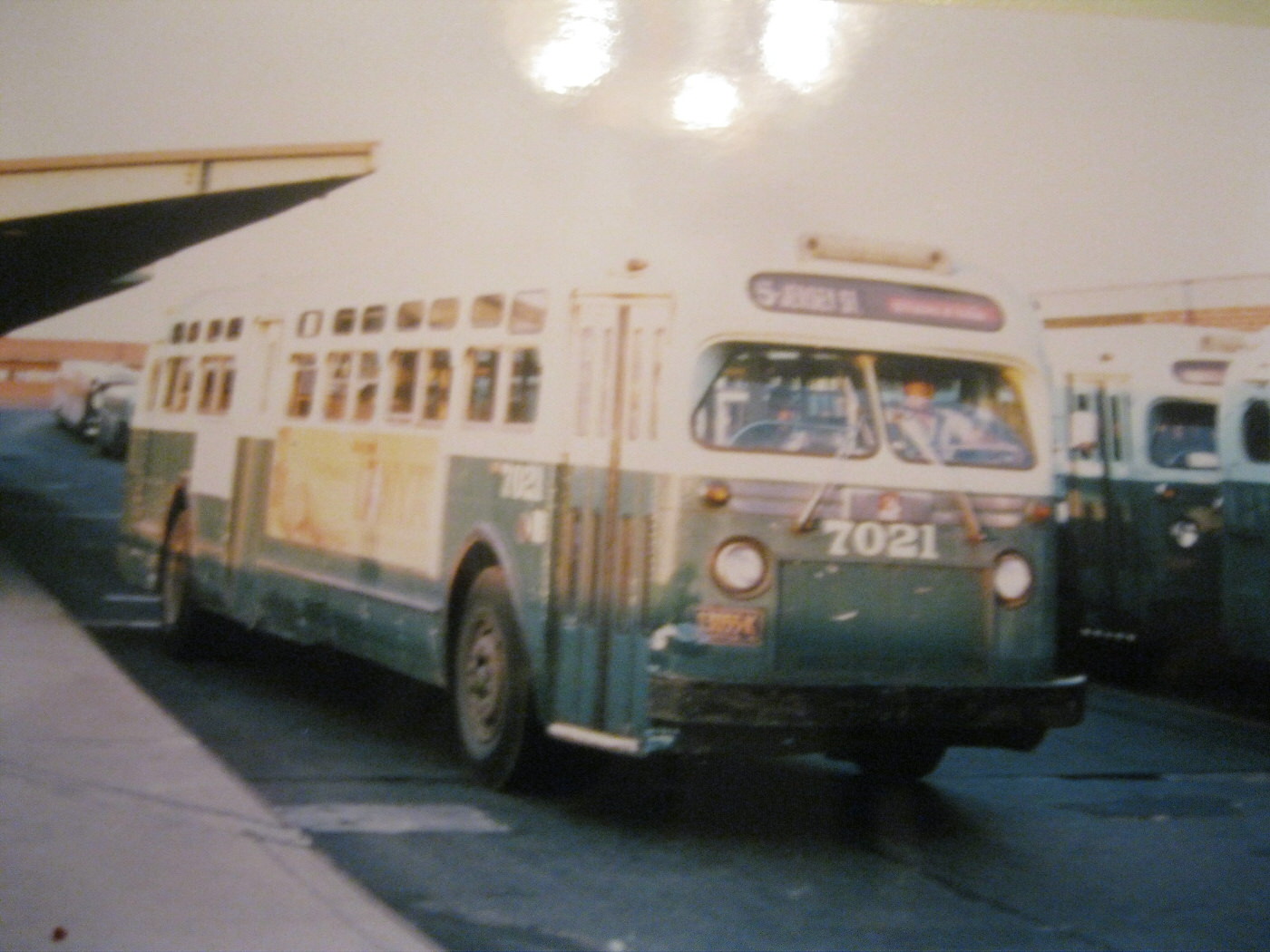 NYCTA No. 7021 working route R5 at the St. George Ferry Terminal.