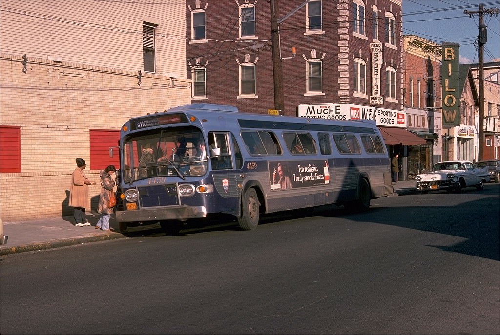NYCTA No. 4459 working route S110 at Castleton Avenue & Barker Street, 1977.