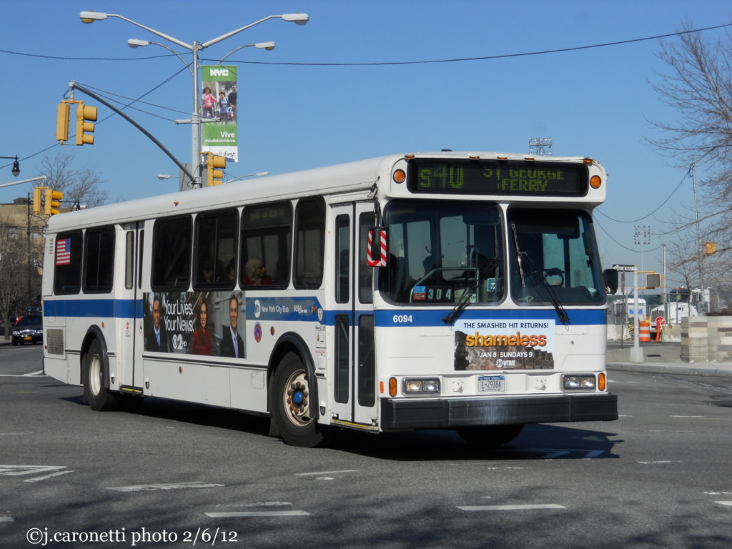 NYCTA No. 6094 working route S40 at Bay Street & Richmond Terrace, 2012.