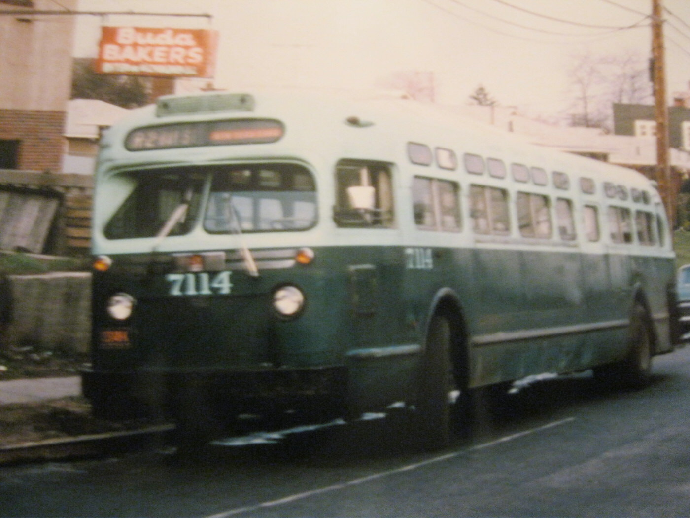 NYCTA No. 7114 working route R2 at Richmond Road & Colfax Avenue.