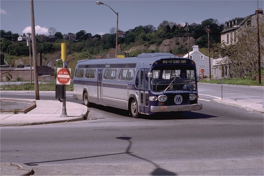 NYCTA No. 4475 working route R104 at Van Duzer & Bay Streets, 1973.