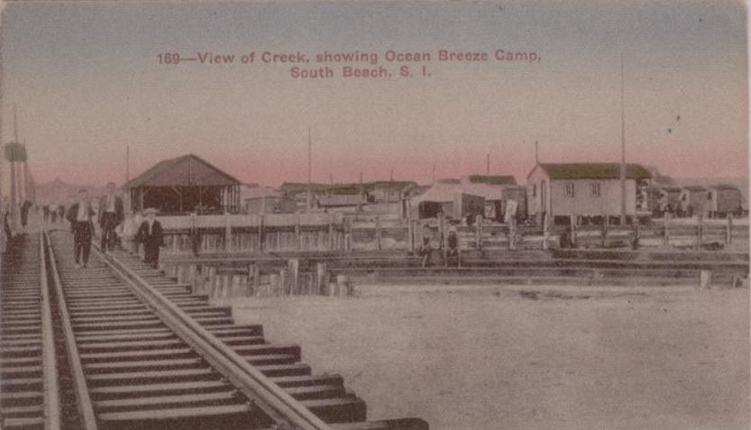 View of Creek, showing Ocean Breeze Camp, 1900s.