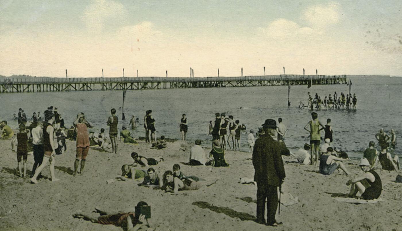Bathing Scene and Happy Land Pier, South Beach, Staten Island, 1900s.