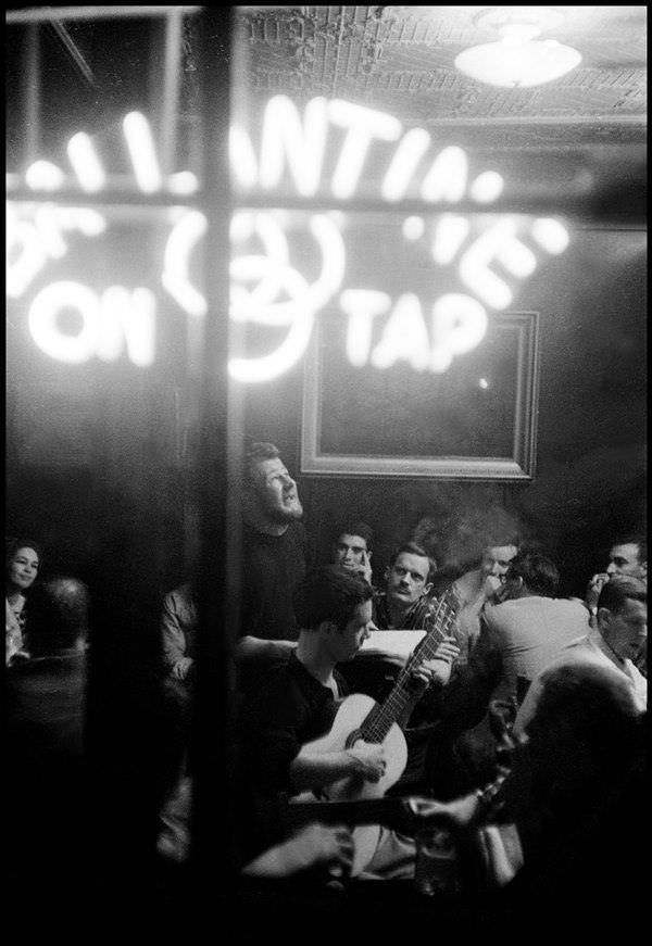 Hugh Nanton Romney sings at McSorley's saloon, 1959.