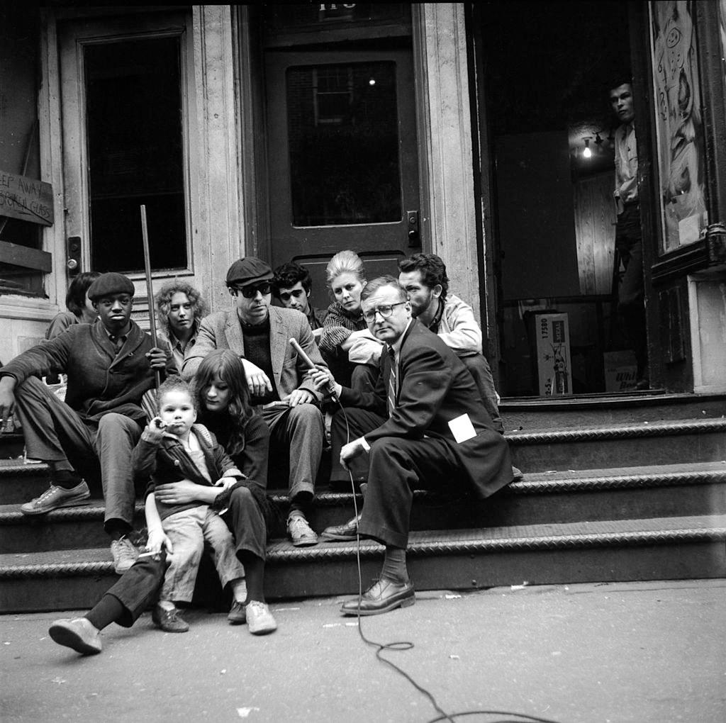 Television journalist Danny Meenan interviewing Beatnik members, New York, 1960.