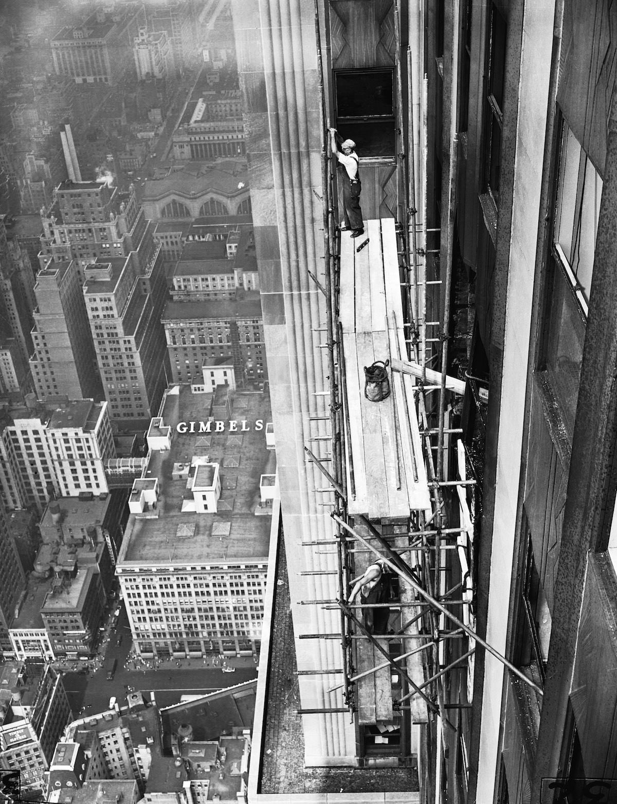 Workmen erect scaffolding on the 33rd Street Side of the Empire State Building, 1945.