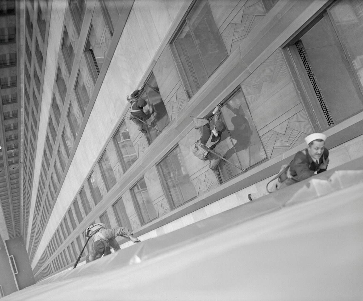 Window washers cleaning the Empire State Building, 1932.
