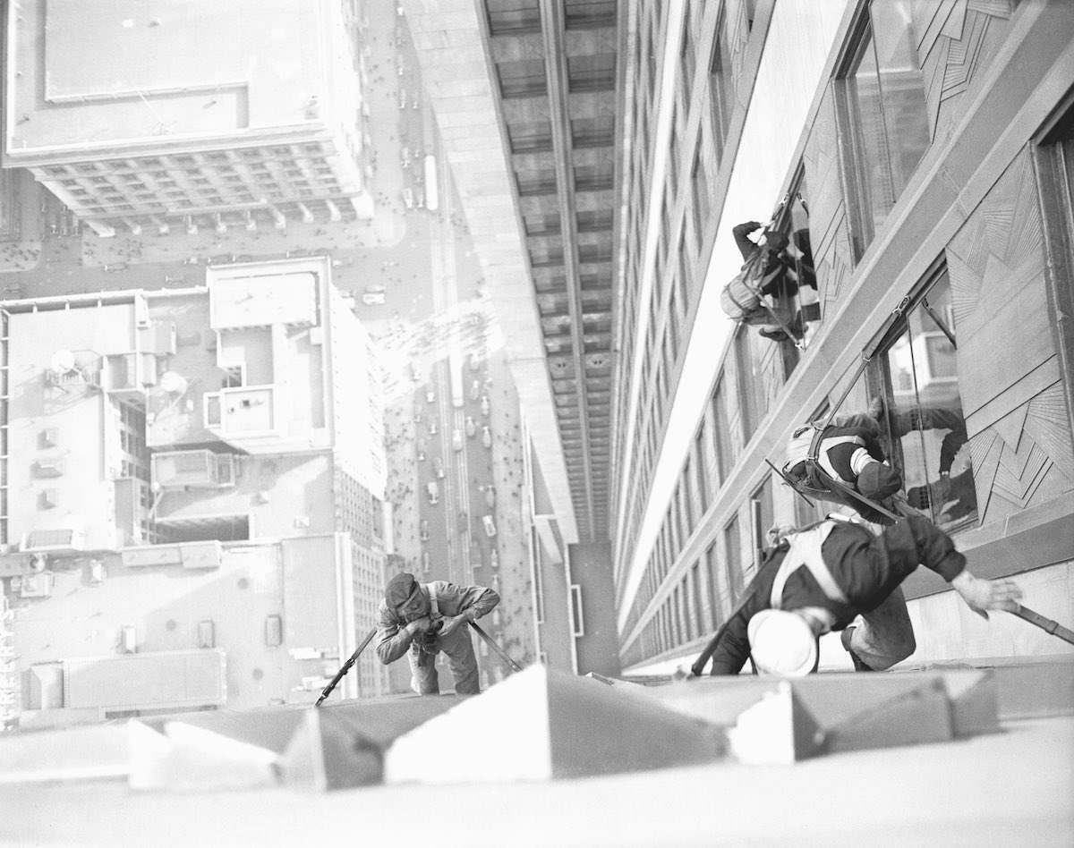 Window washers on the 34th street side of the Empire State Building, 1932.