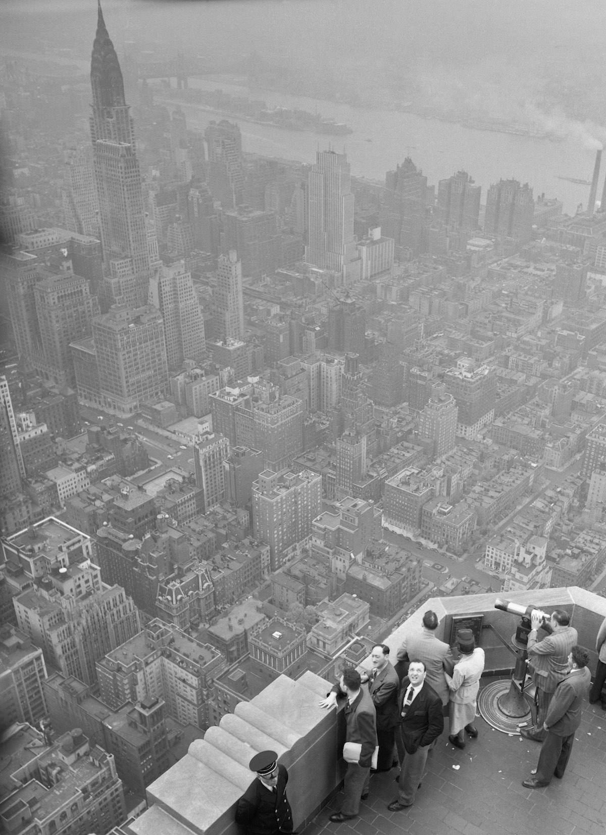 Aerial view of New York City atop the Empire State Building, 1930s.
