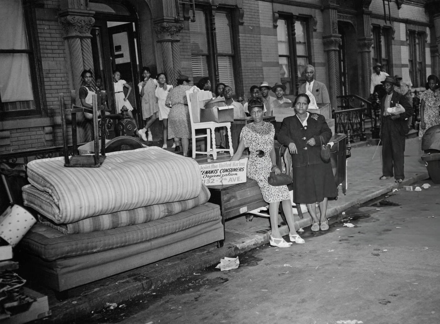 Henriette De Shields evicted from her home in Harlem with her family, 1947.