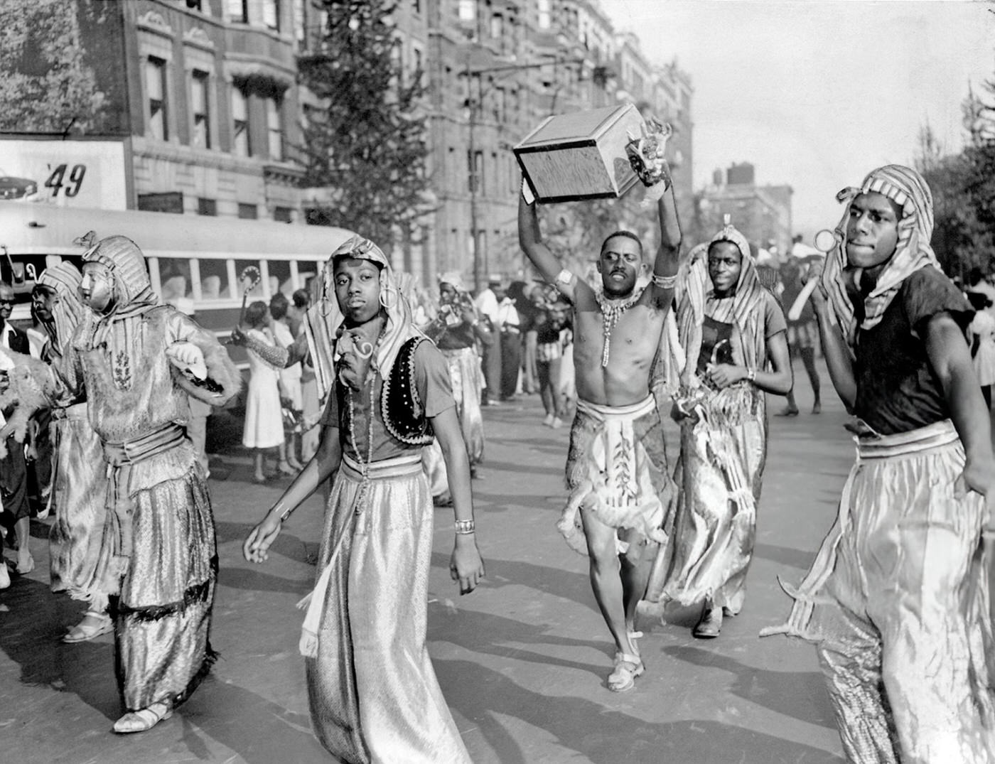 Costumed participants in the annual West Indian Day parade on Seventh Avenue in Harlem, 1940s.