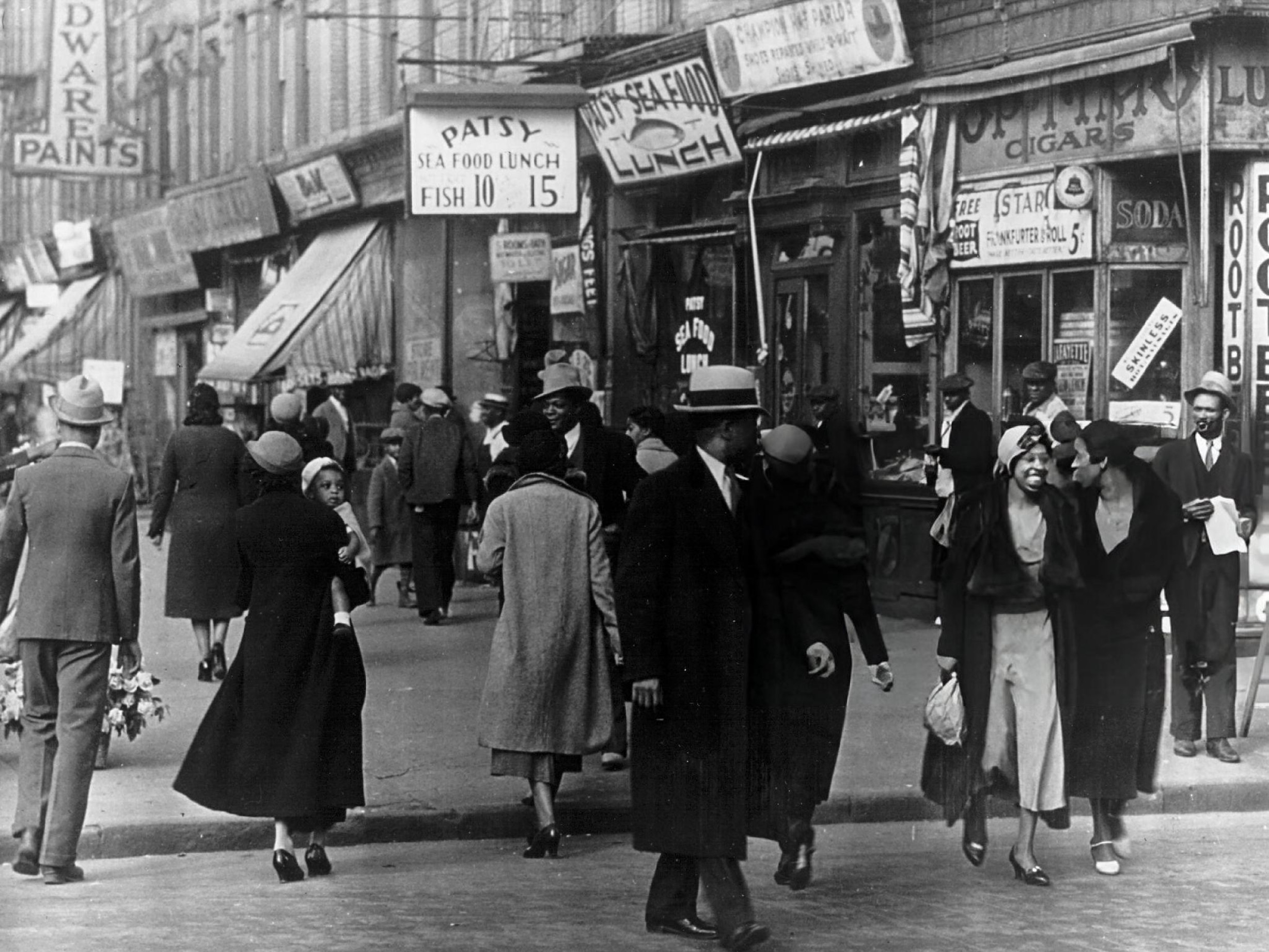 This is a 1942 Harlem street scene in New York City, 1942.