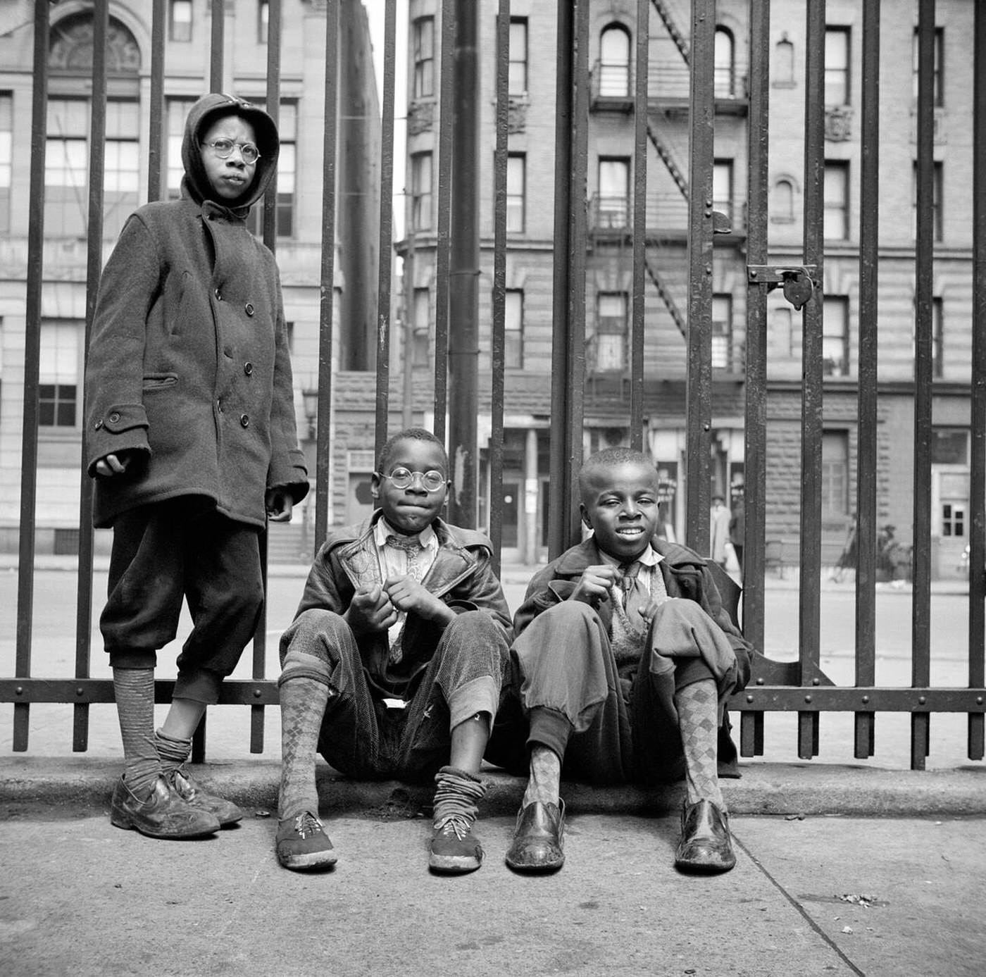 Three boys portrait, Harlem, 1942.