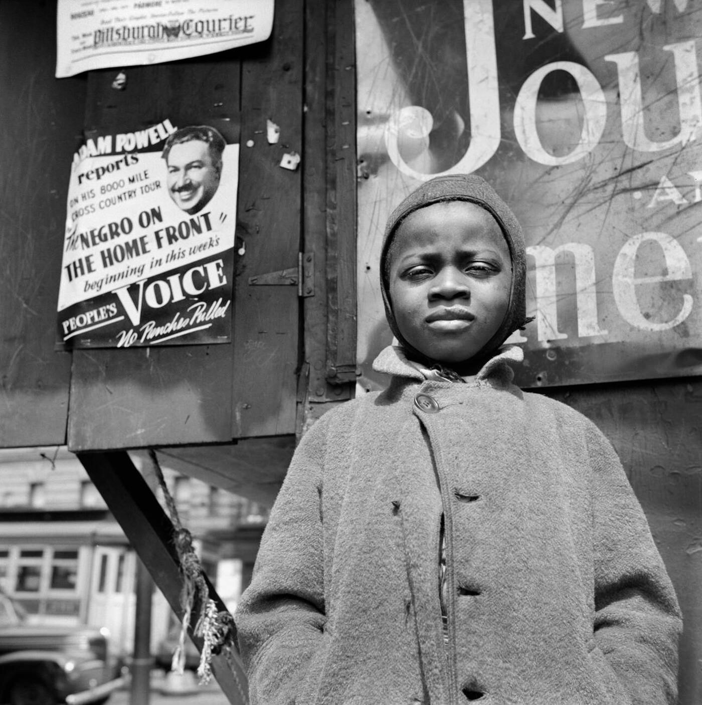 Newsboy, Harlem, 1943.