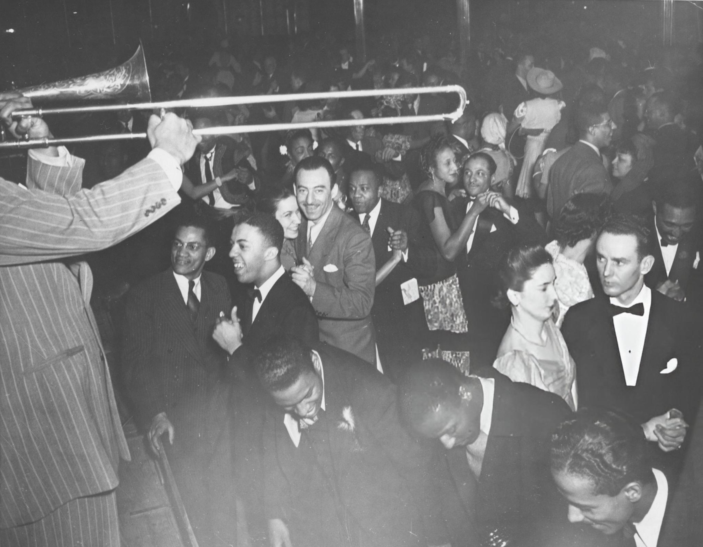 Trombonist at the Beaux Arts Ball at the Savoy Ballroom, Harlem, 1942.