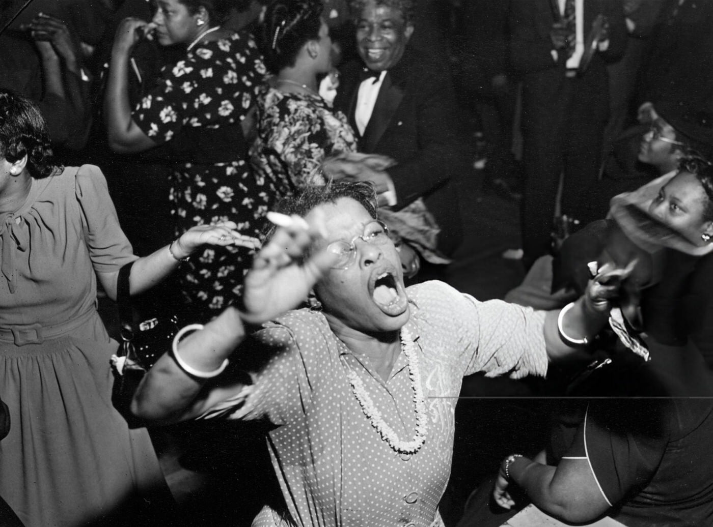 A woman dancing in Harlem, 1944.