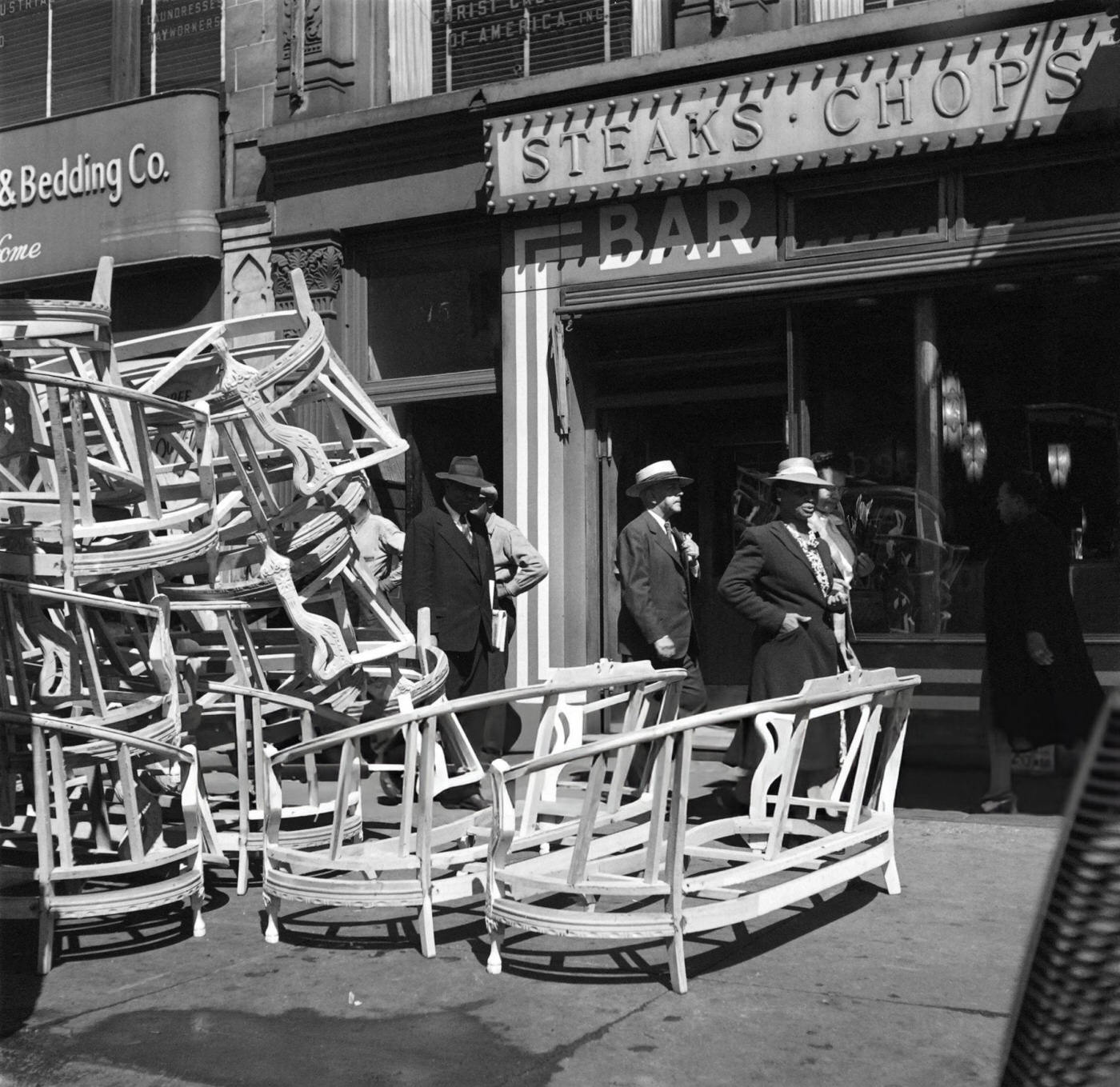People walk past a bar in Harlem, Manhattan, 1946.