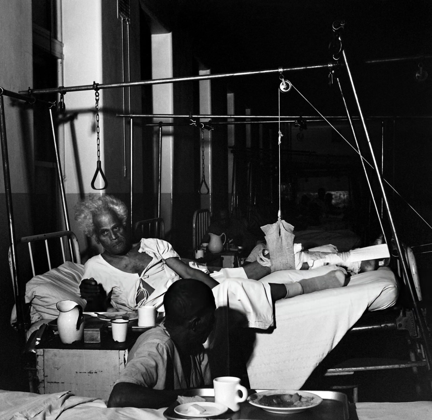 An African American man rests in a hospital of Harlem, Manhattan, 1946.