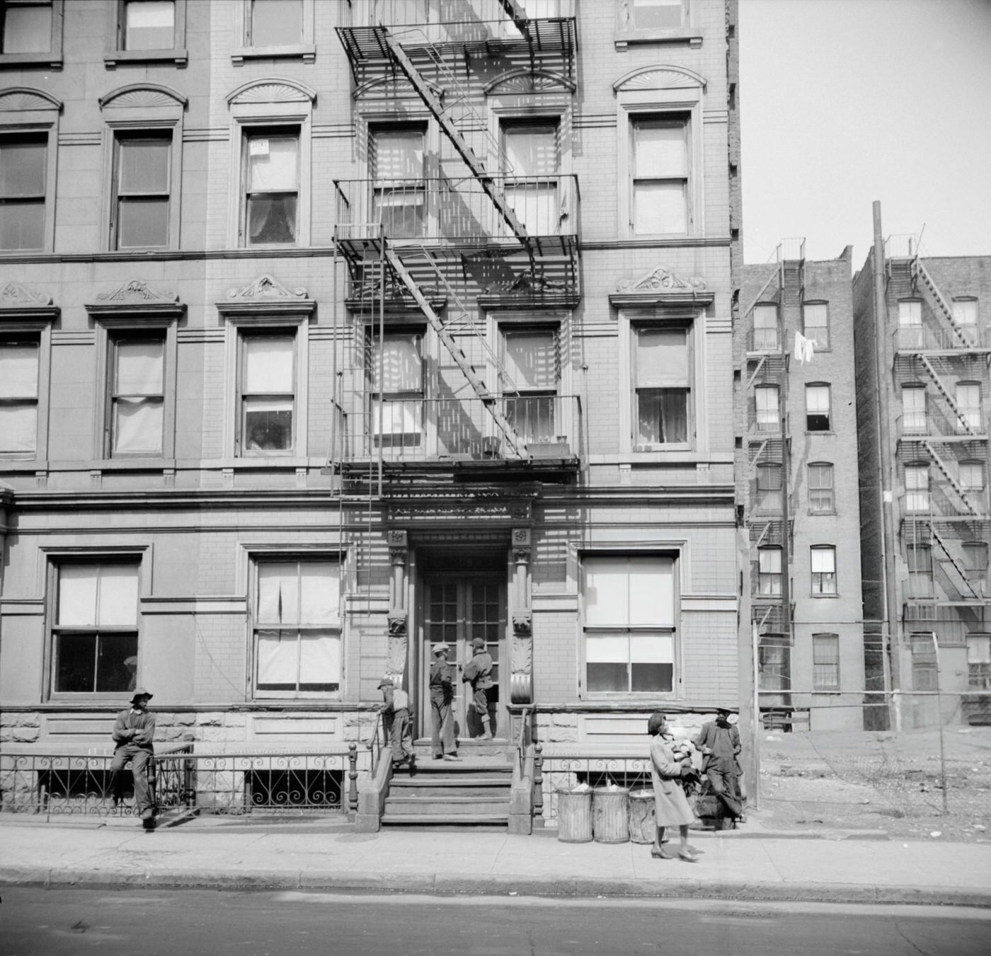 A Harlem apartment house.