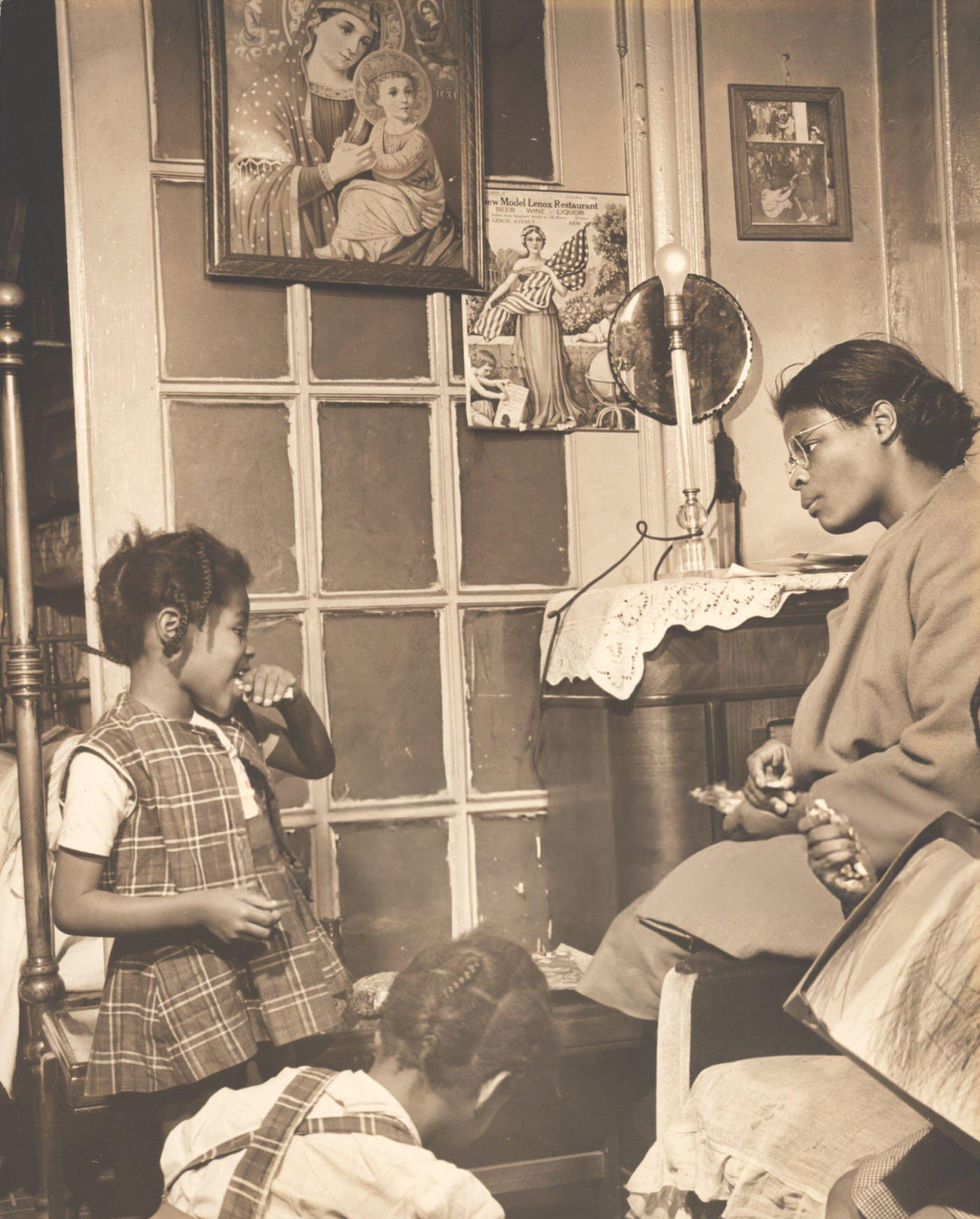 Rebecca and her family relax at home in Harlem, 1947.
