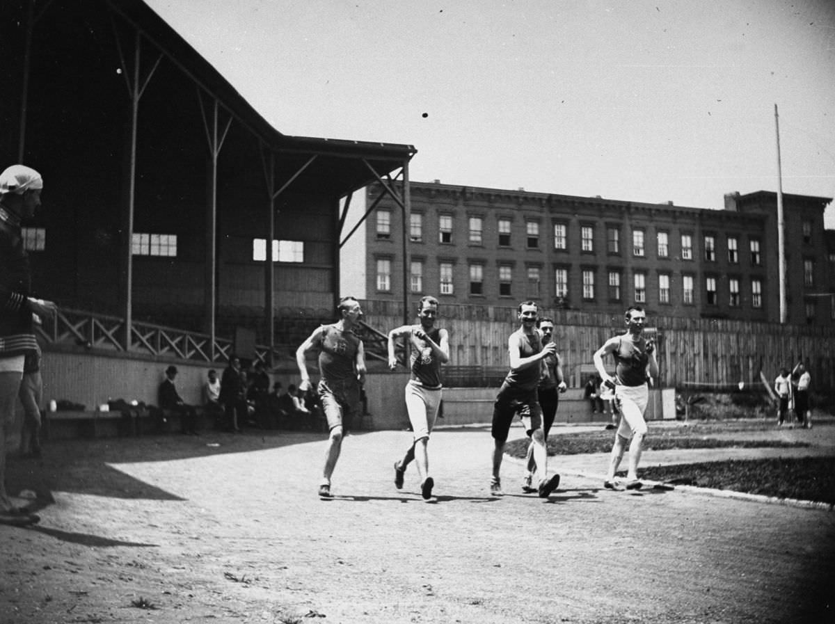 Five men compete in a walking race, 1886.