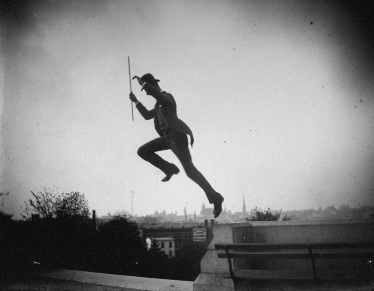 Mr. Stokes jumps off a wall in Fort Greene Park, 1886.