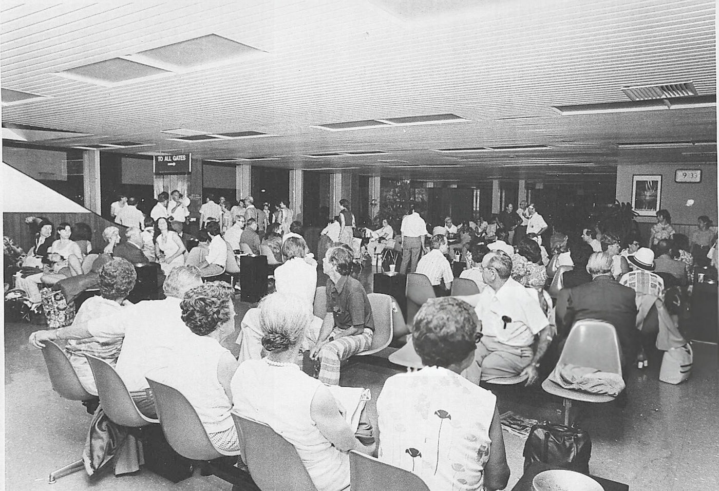 Travelers wait out the blackout at JFK Airport, 1977.