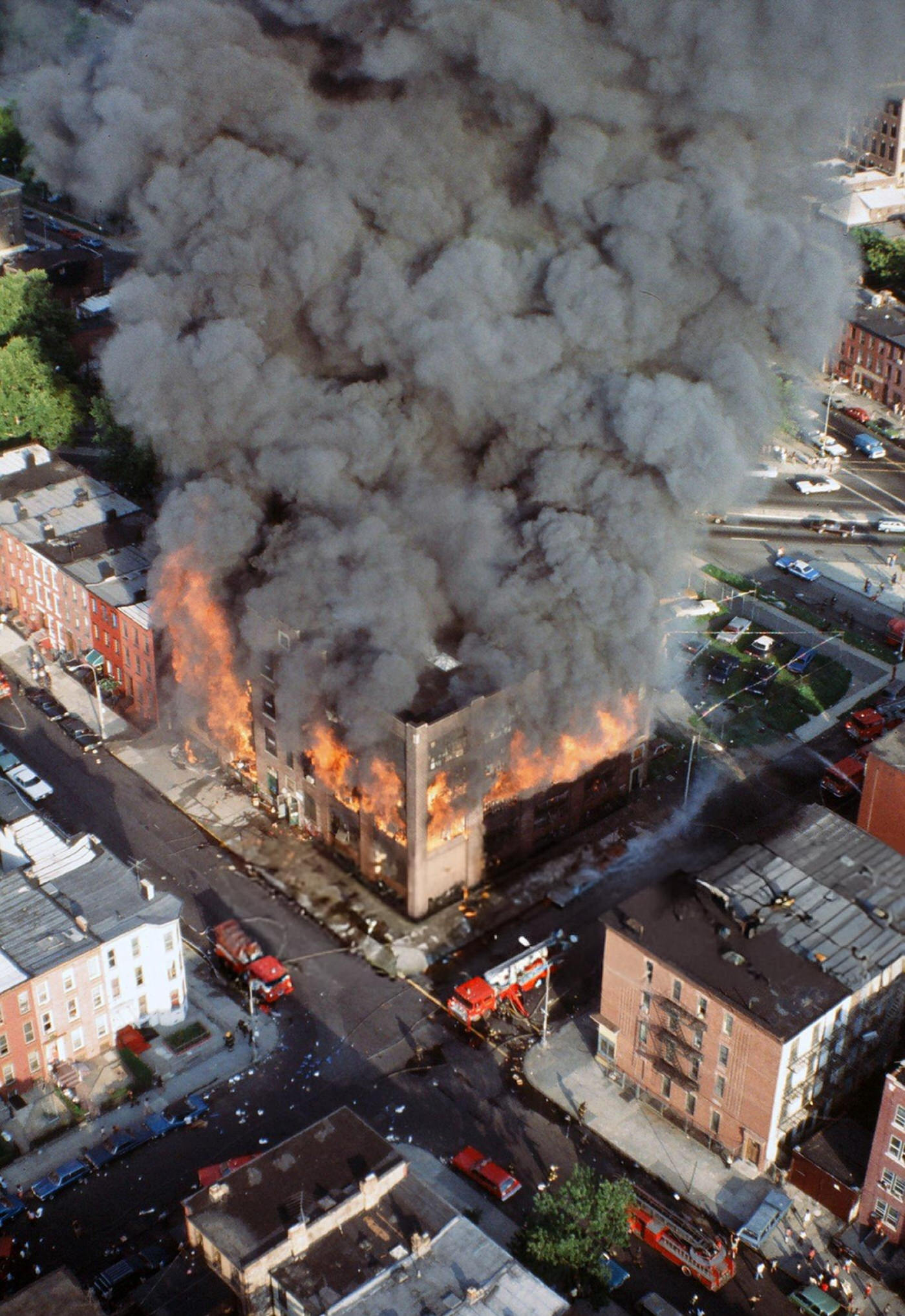 Aerial of a building burning in the wake of the New York City blackout, Brooklyn, 1977.