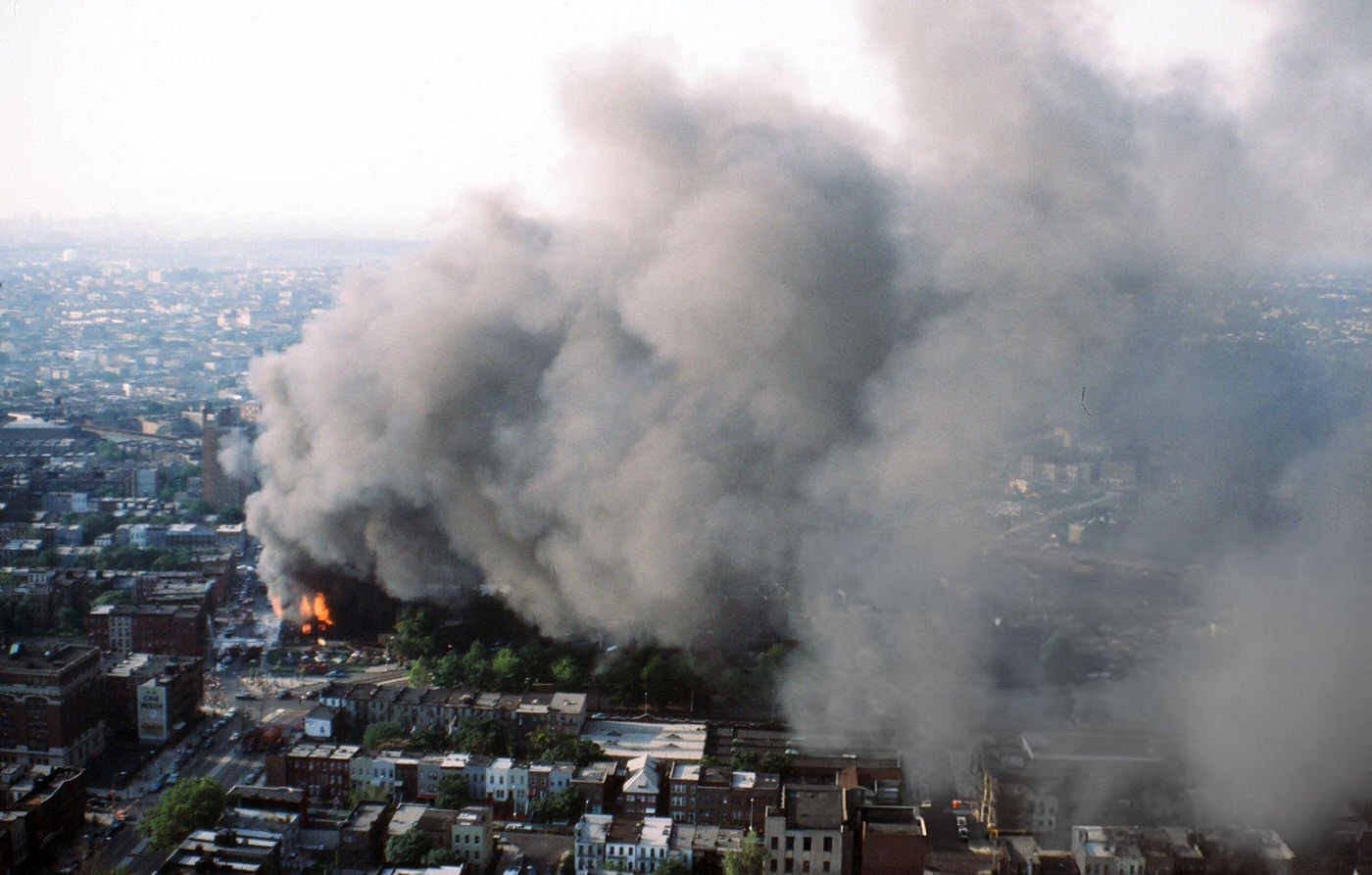 Aerial of a building burning in the wake of the New York City blackout, Brooklyn, 1977.