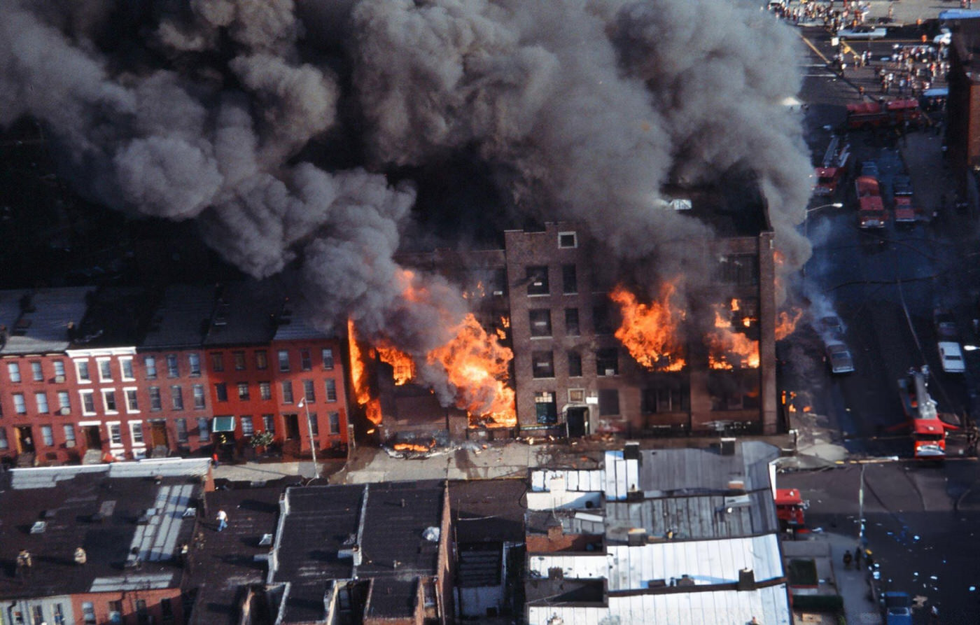 Aerial of a building burning in the wake of the New York City blackout, Brooklyn, 1977.