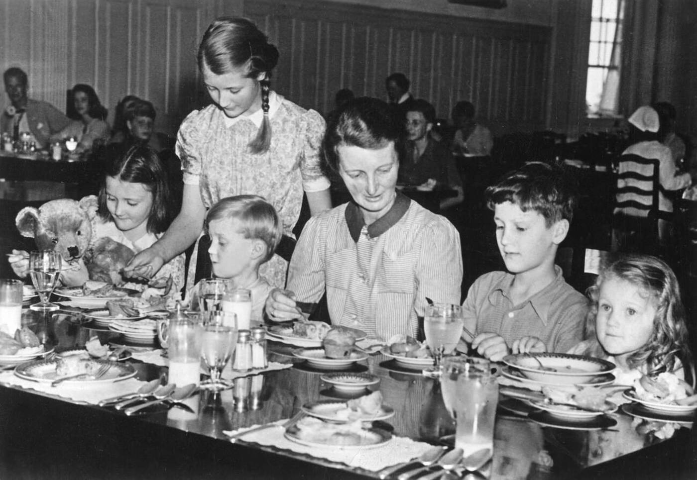 English children evacuated to the USA having breakfast after their arrival in New York City during World War II.