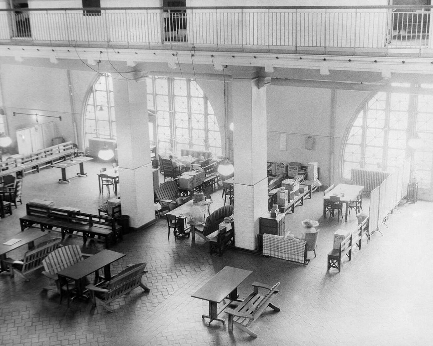 A gathering area for German families detained as 'enemy aliens' at Ellis Island during World War II, 1943.