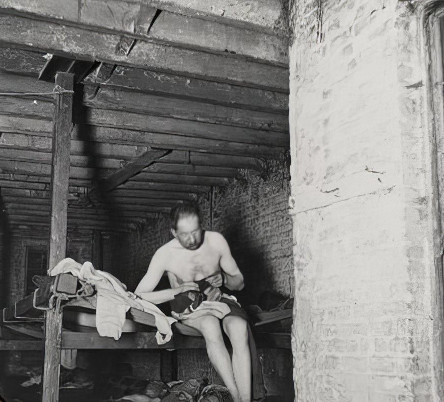 Lodger in Pell Street lodging house, circa 1890.