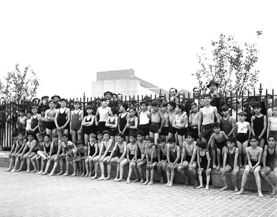 Young children waiting for the new pool at Thomas Jefferson Park to open, East Harlem, 1936.